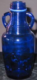 BLUE GLASS BOTTLE WITH HANDLES