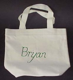 IVORY CANVAS BAG WITH BRYAN IN GREEN LETTERS