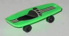 SMALL (2 1/4 LONG BY 1/2 HIGH) GREEN  PLASTIC SKATE BOARD